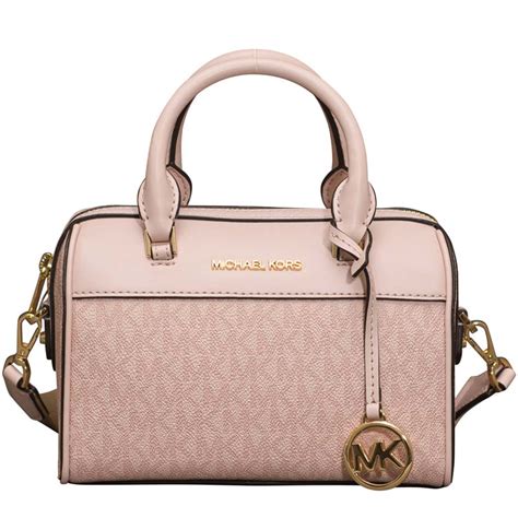 michael kors travel xs duffle xbody|Jet Set Travel Small Logo Duffle Crossbody Bag .